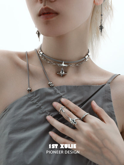 Punk dreamcore necklace layered with silver chains and unique pendants for a stylish, edgy look