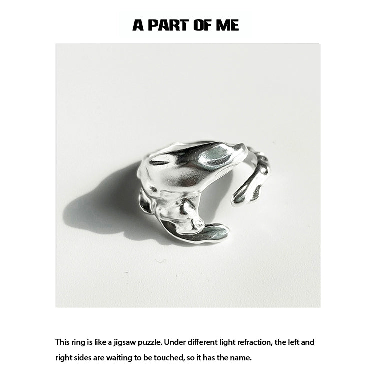 A PART OF ME imperfect puzzle punk ring designed with unique jigsaw puzzle curves and reflections