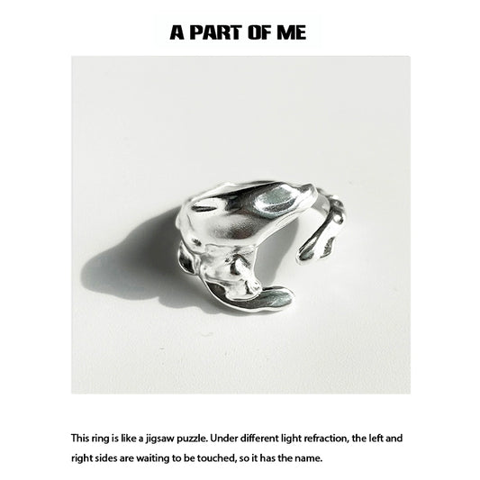 A PART OF ME imperfect puzzle punk ring designed with unique jigsaw puzzle curves and reflections
