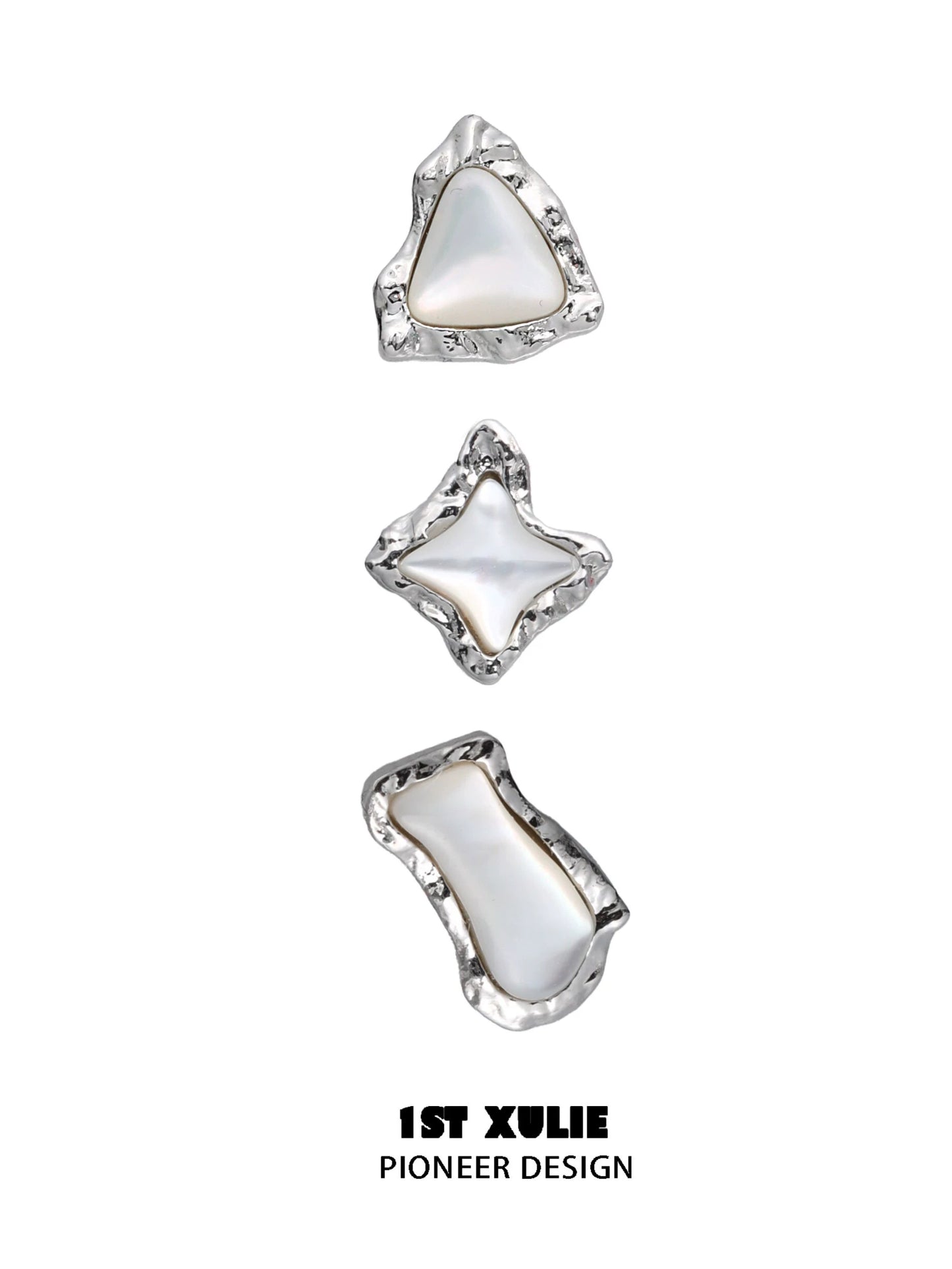 Punk moon fragment earrings in silver with unique organic shapes and glossy finish