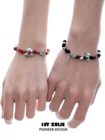 Puppy couple braided bracelet set with red and black designs featuring dog charms for pet lovers