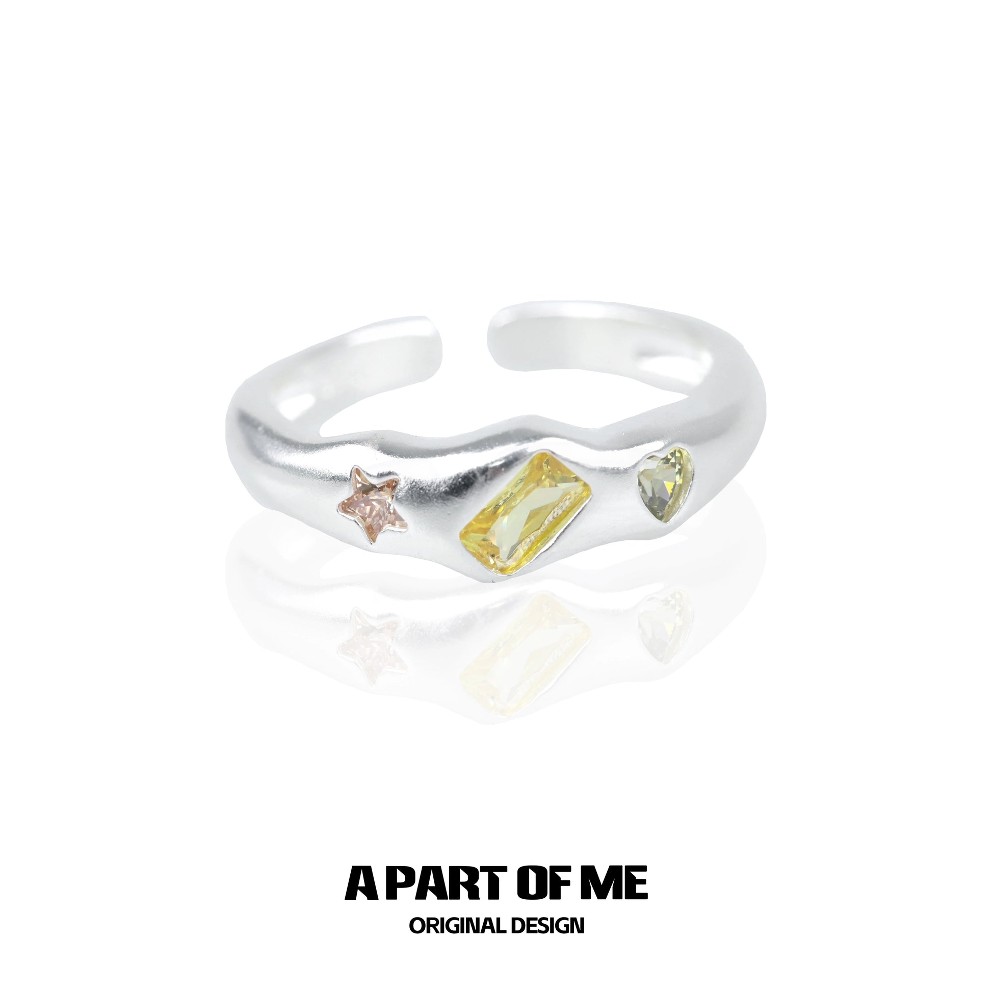 A PART OF ME rainbow star zircon ring with colorful gemstones in a unique design