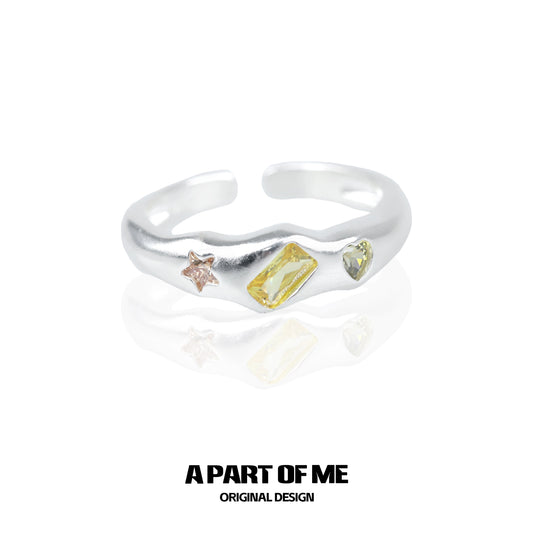 A PART OF ME rainbow star zircon ring with colorful gemstones in a unique design