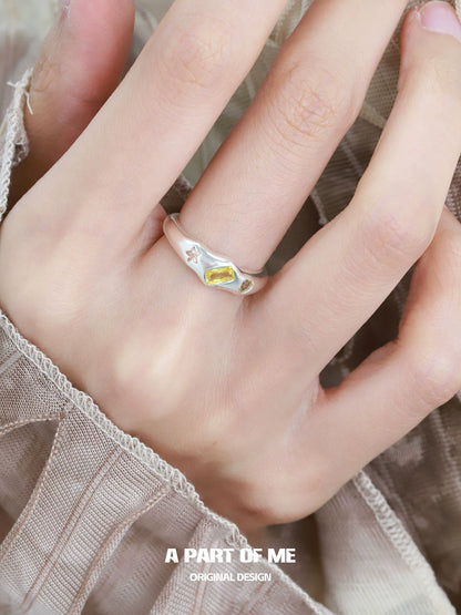 A PART OF ME rainbow star zircon ring featuring colorful gemstones and a unique design