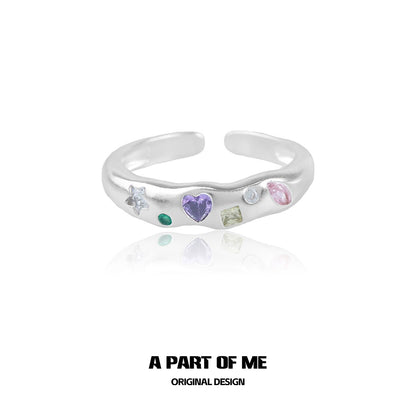 A PART OF ME rainbow zircon love ring with colorful gemstones set in a polished silver band