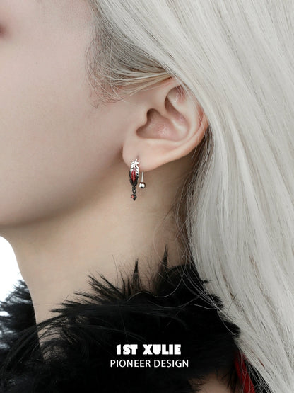 Stylish red feather earrings by 1STXULIE featuring a unique design for a trendy look