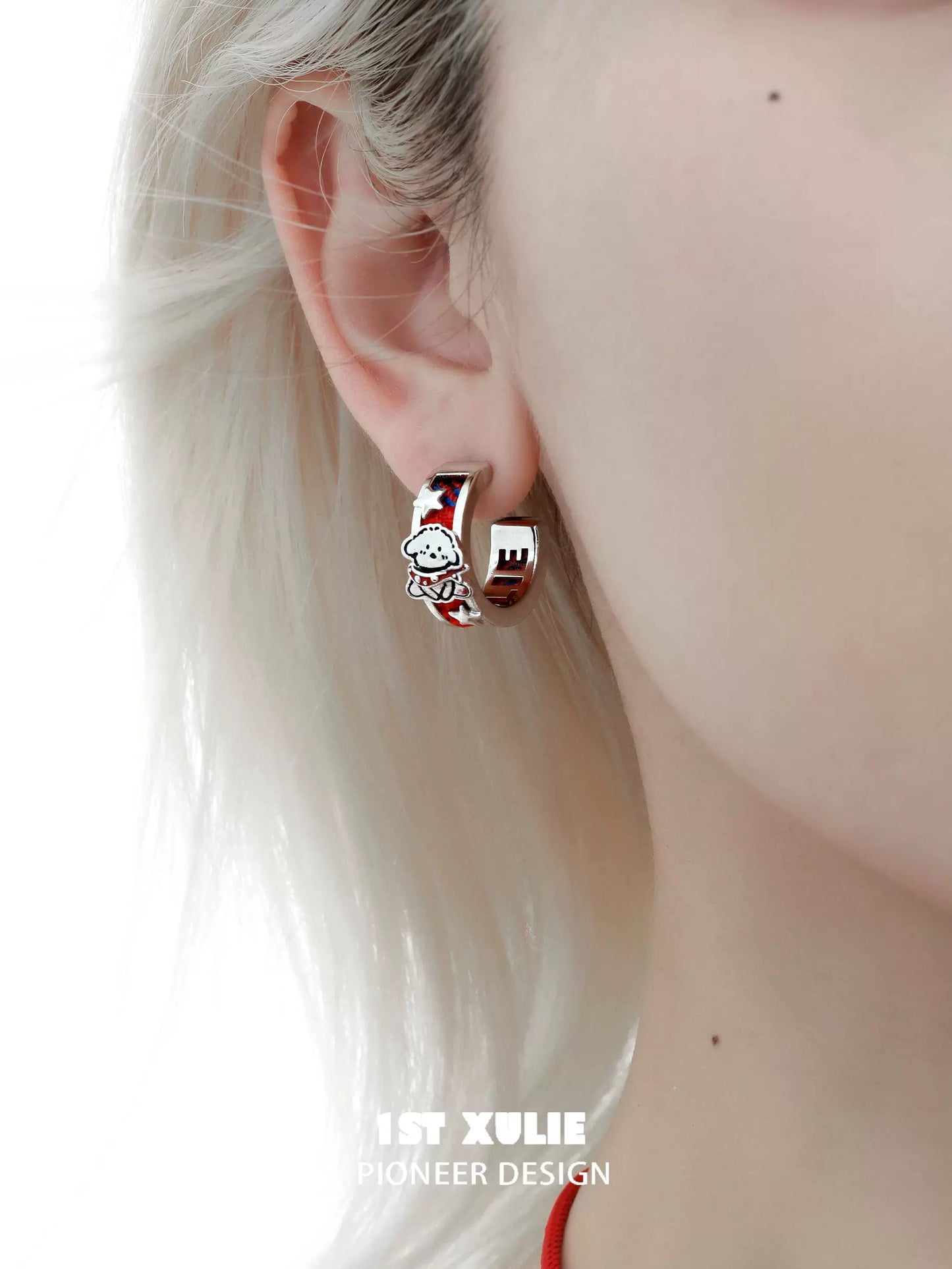 Stylish red puppy earrings featuring a cute design, perfect for pet lovers and fashion enthusiasts