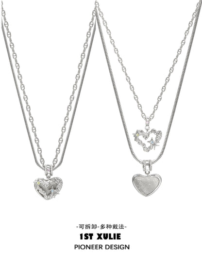 Silver removable clavicle chain necklace featuring two heart pendants, perfect for layering