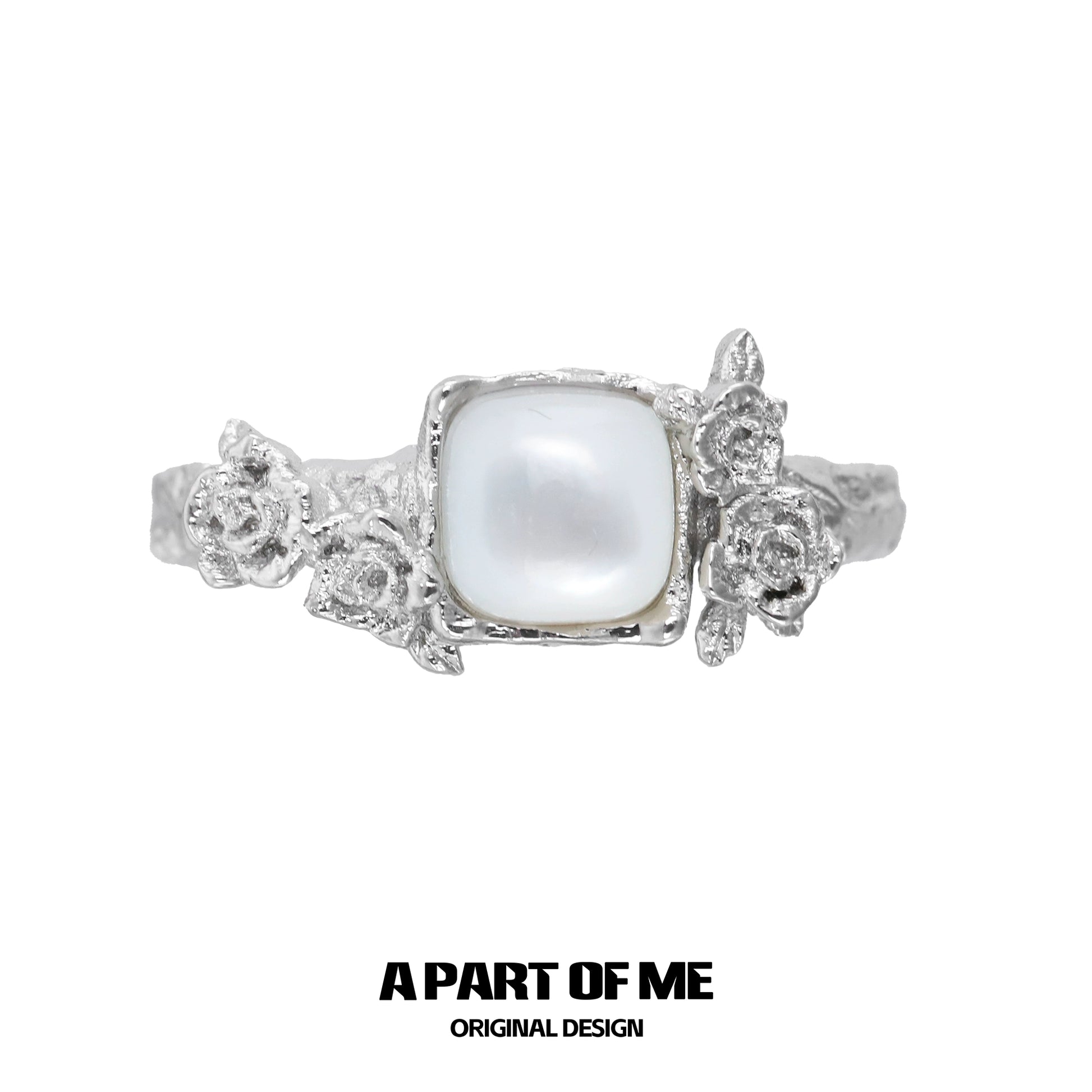 A Part of Me rose silver ring featuring a square pearl and detailed flower accents