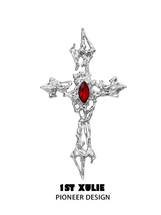 Sacred cross silver brooch with intricate design and red gemstone accent for stylish accessories
