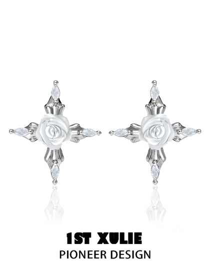 Elegant sacred rose cross earrings featuring a white rose and sparkling accents for a unique look
