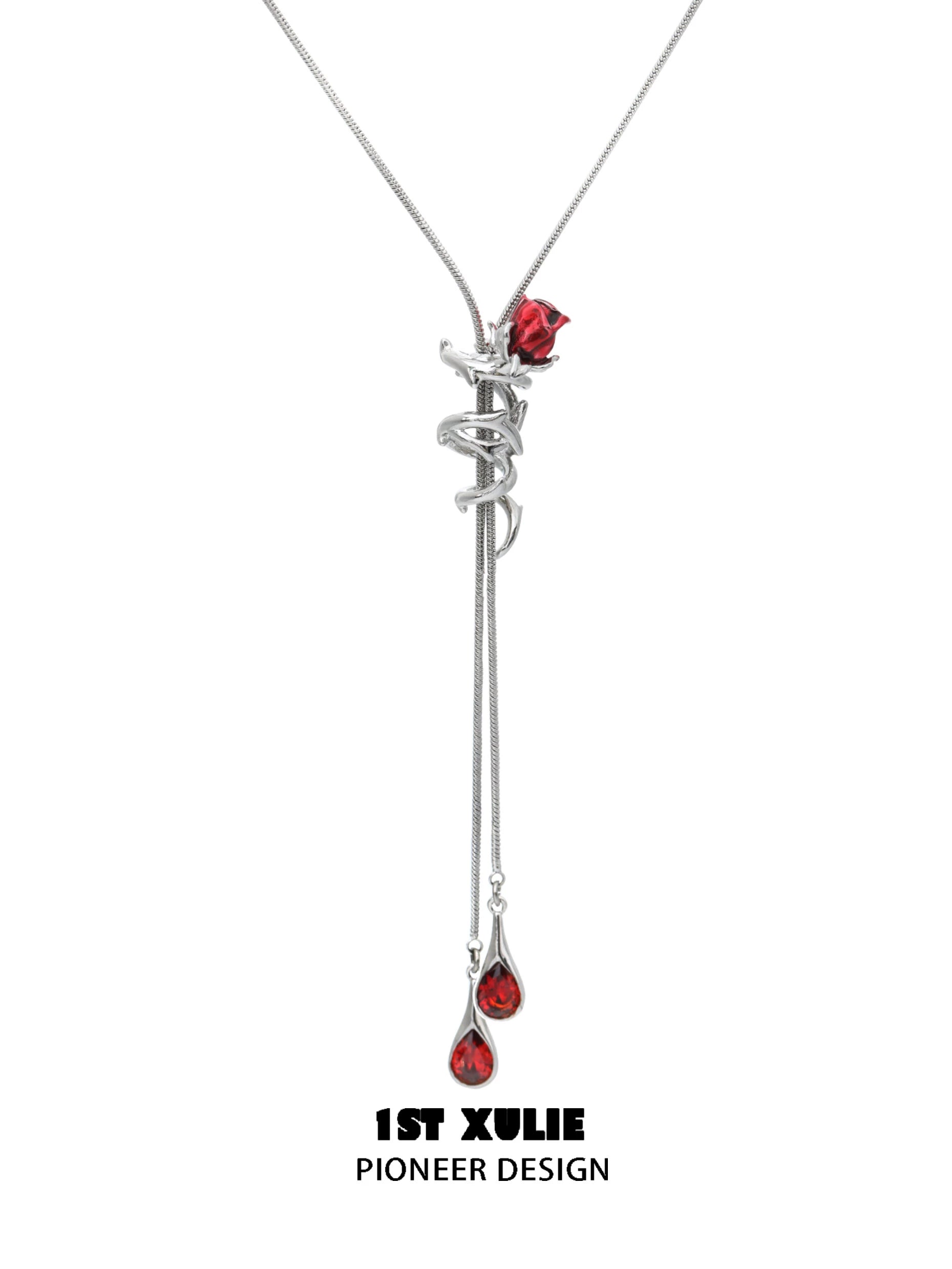 Scarlet rose clavicle chain necklace by 1ST XULIE featuring a delicate design with red gemstone accents