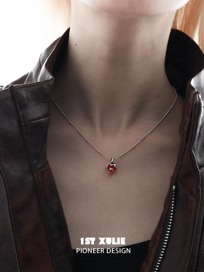 Serpent silver necklace featuring a striking pendant on a delicate chain, worn elegantly