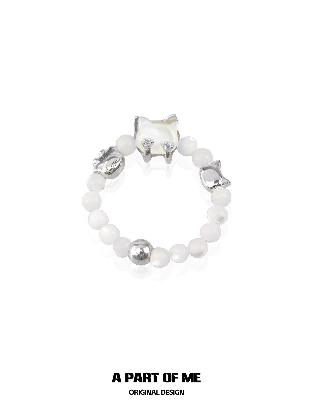 Stylish shell cat beaded ring featuring silver accents and white beads, perfect for unique accessories