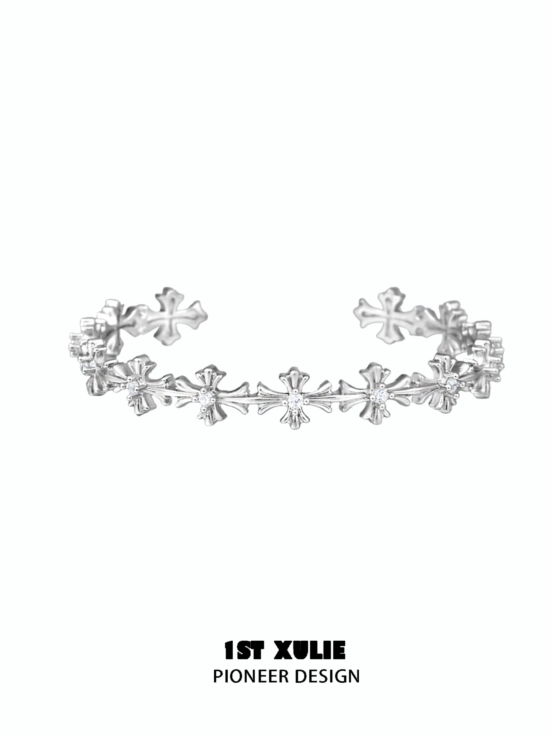 Elegant silver cross bracelet from 1STXULIE featuring a unique pioneer design