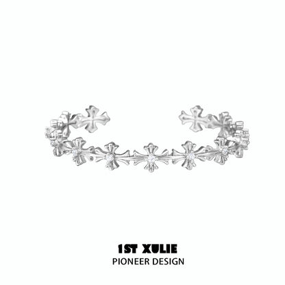 Stylish silver cross bracelet from 1STXULIE featuring intricate design for a modern look