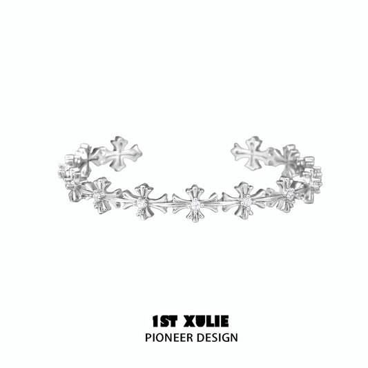 Stylish silver cross bracelet from 1STXULIE featuring intricate design for a modern look