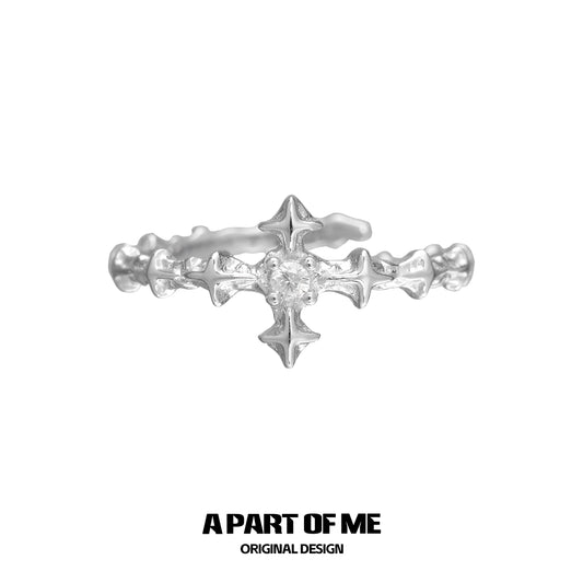 A PART OF ME silver cross ring in a unique textured design featuring small decorative details