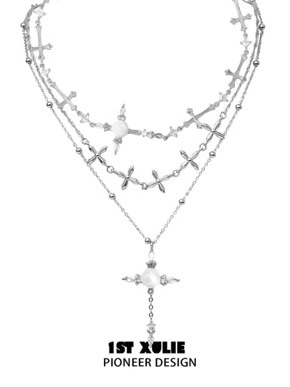 Elegant silver rose cross necklace featuring layered crosses and decorative beads