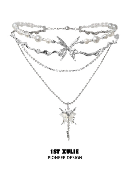 Skeleton butterfly pearl necklace with layered silver chains and elegant pearl accents