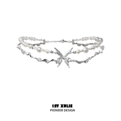 Stylish skeleton butterfly pearl necklace featuring silver-tone accents and elegant design