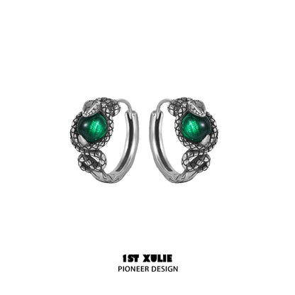 Slytherin fang earrings featuring a green gemstone and snake design for a stylish look