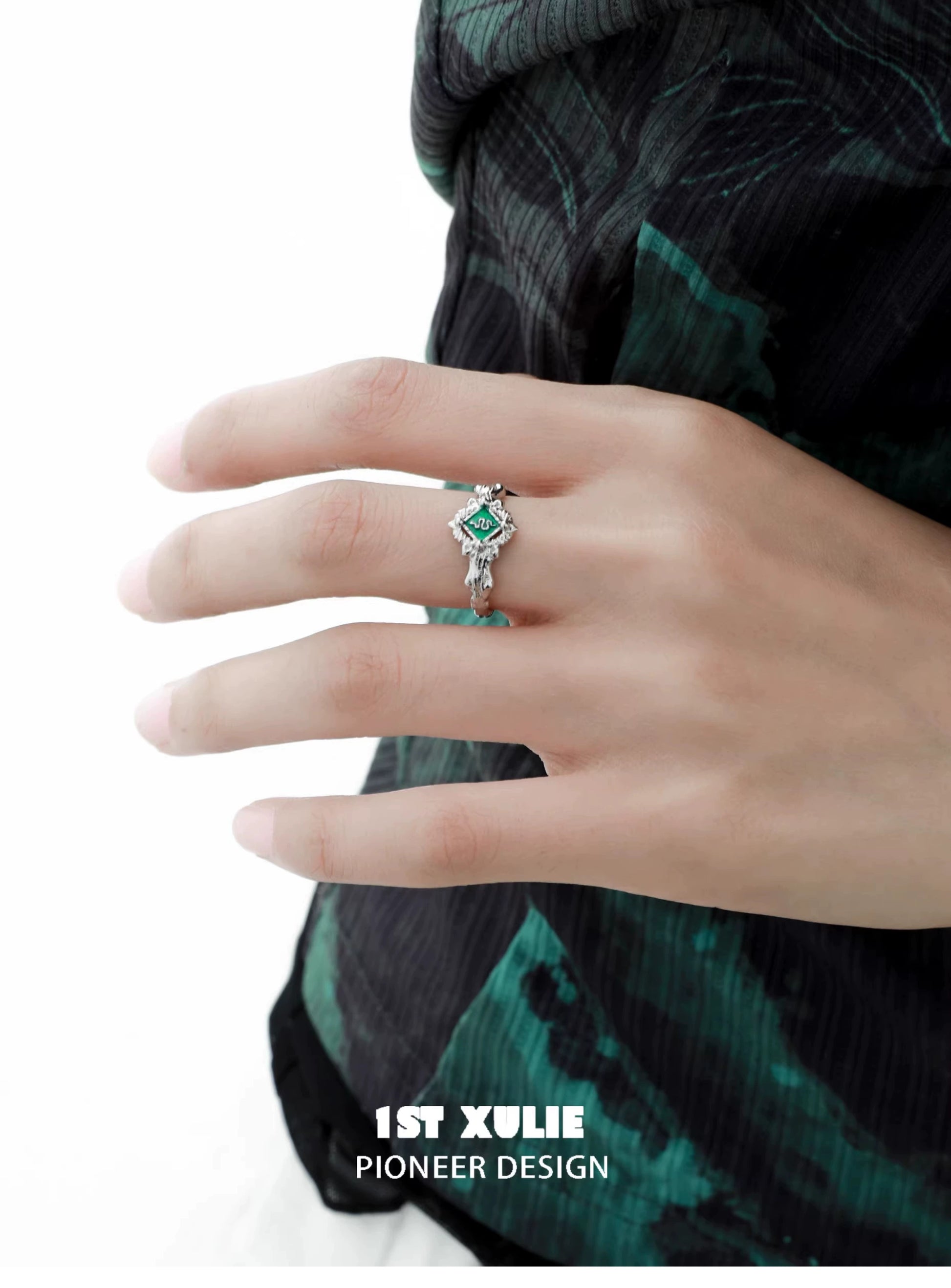 Slytherin green snake ring displayed on a model's hand, showcasing its unique design and elegance