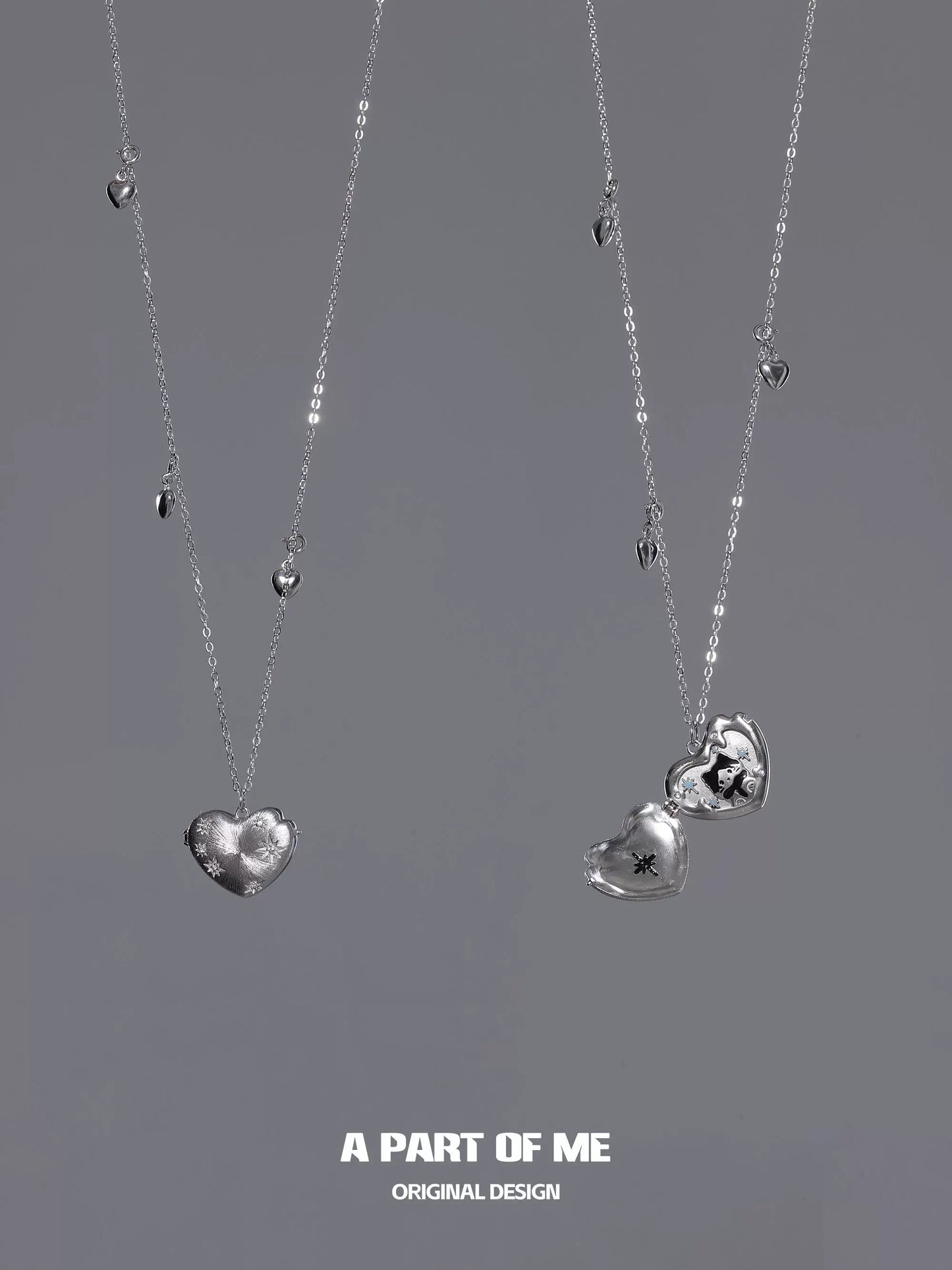 A PART OF ME snow kitten love pendant necklace featuring intricate heart designs in silver