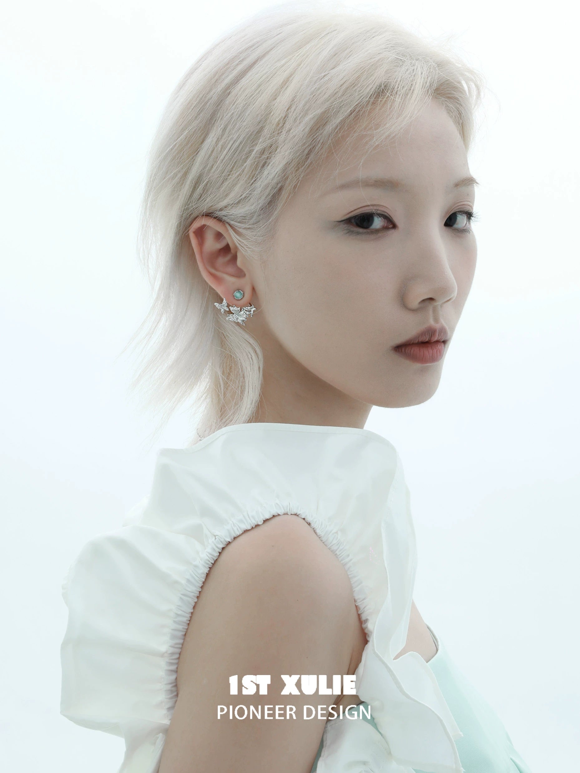 1STXULIE Snowflake Butterfly Earrings showcased on a model for elegant styling