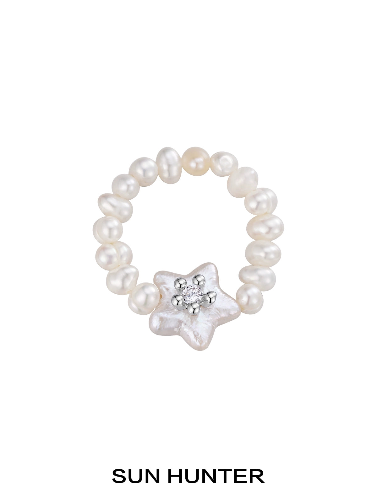 SUN HUNTER star pearl ring featuring shimmering star-shaped pearl with surrounding little pearls