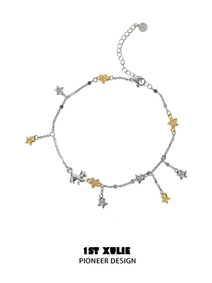 Star picking cat silver anklet with gold and silver star charms for a whimsical accessory