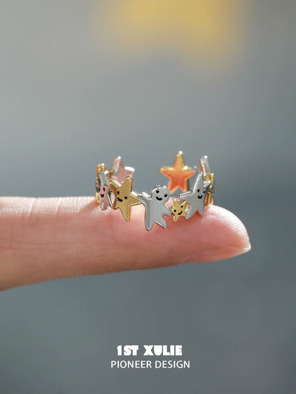 Unique star shaped silver ring featuring colorful star accents for stylish jewelry lovers