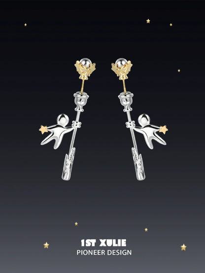Unique 1ST XULIE star stud earrings featuring playful astronaut design and gold accents