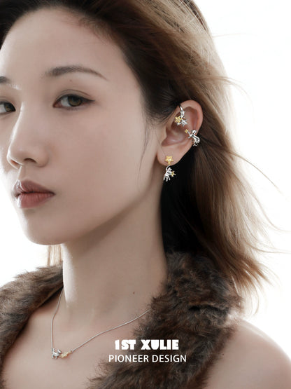 Model wearing a starry cat ear cuff with a delicate design, showcasing elegance and style