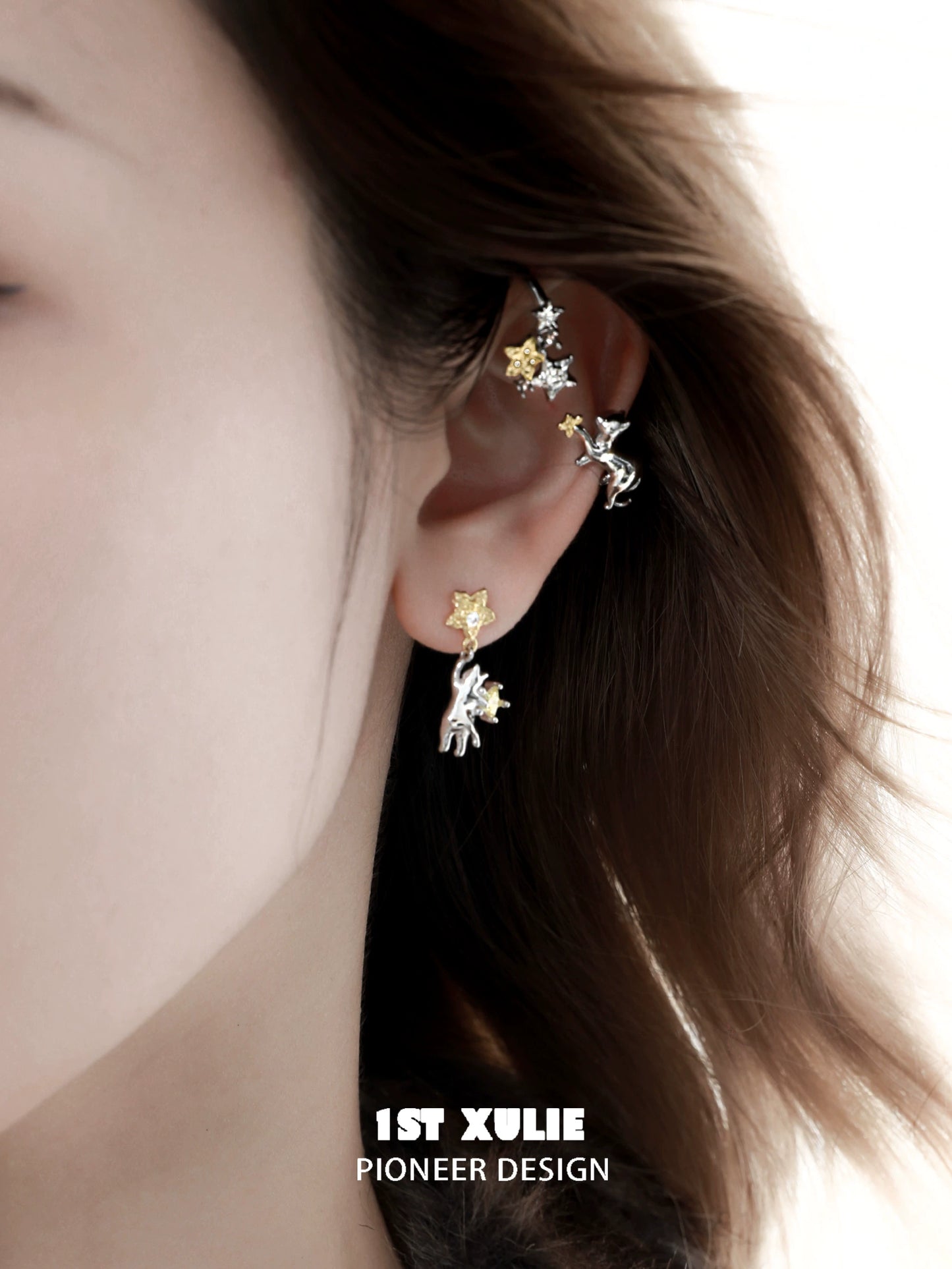 Starry cat ear cuff featuring silver and gold stars designed for unique fashion statements