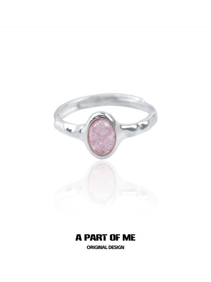 A PART OF ME strawberry stone silver ring with a polished finish and oval stone design