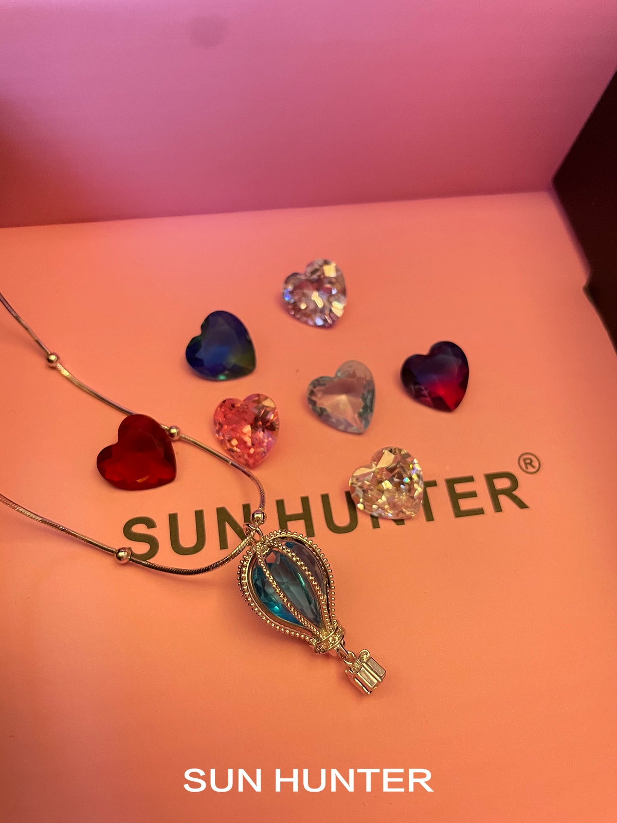 Sun Hunter Jewelry colorful balloon zircon necklace for women displayed with heart-shaped gems