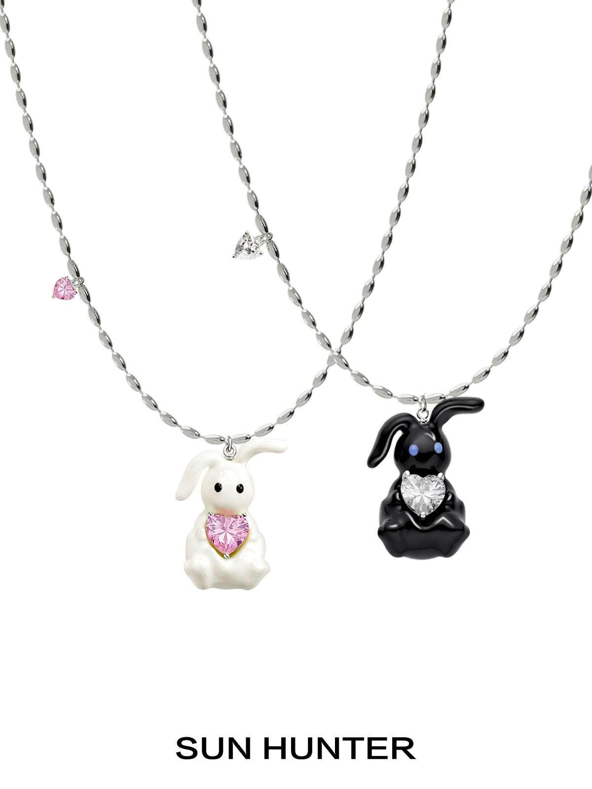 Sun Hunter jewelry cute rabbit necklace for women featuring black and white bunnies with heart charms