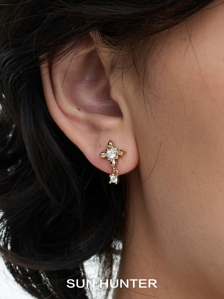 SUN HUNTER Maillard Iris stud earrings set featuring elegant floral design with sparkling gemstones