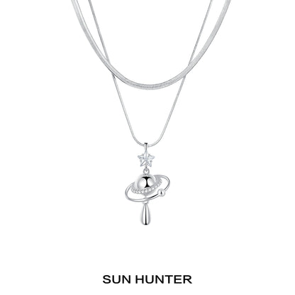 Sun Hunter universe planet silver necklace with star charm and elegant design for space lovers