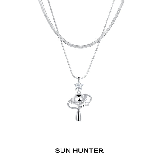 Sun Hunter universe planet silver necklace with star charm and elegant design for space lovers