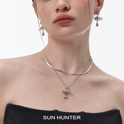 Elegant SUN HUNTER universe planet silver necklace featuring a unique planet design
