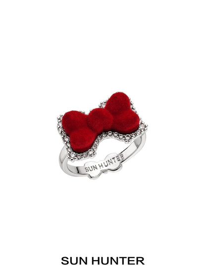 Sun Hunter velvet butterfly heart ring featuring a red velvet bow and sparkling accent stones