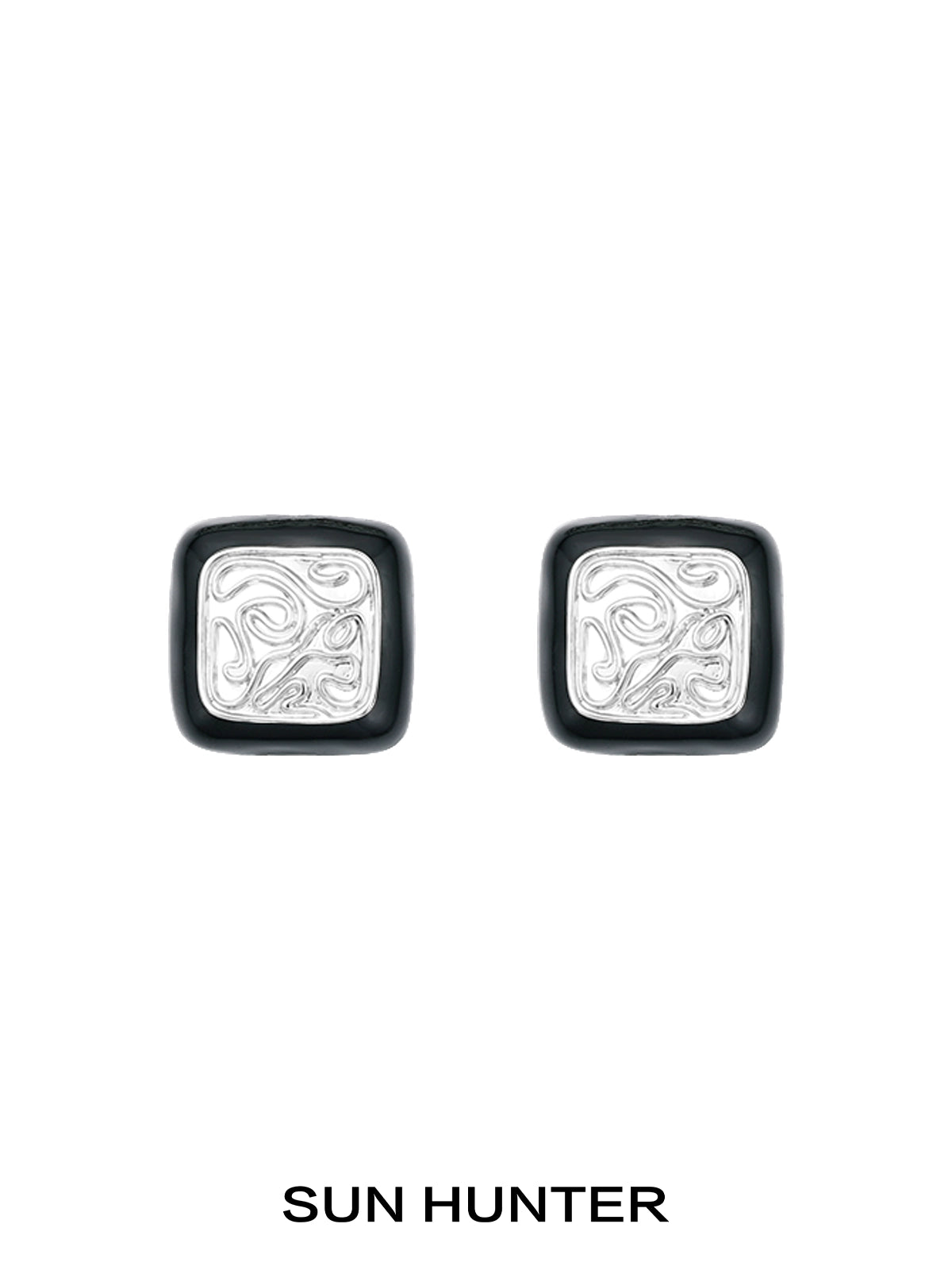 Elegant vintage coin stud earrings by SUN HUNTER with intricate silver designs and a classic look