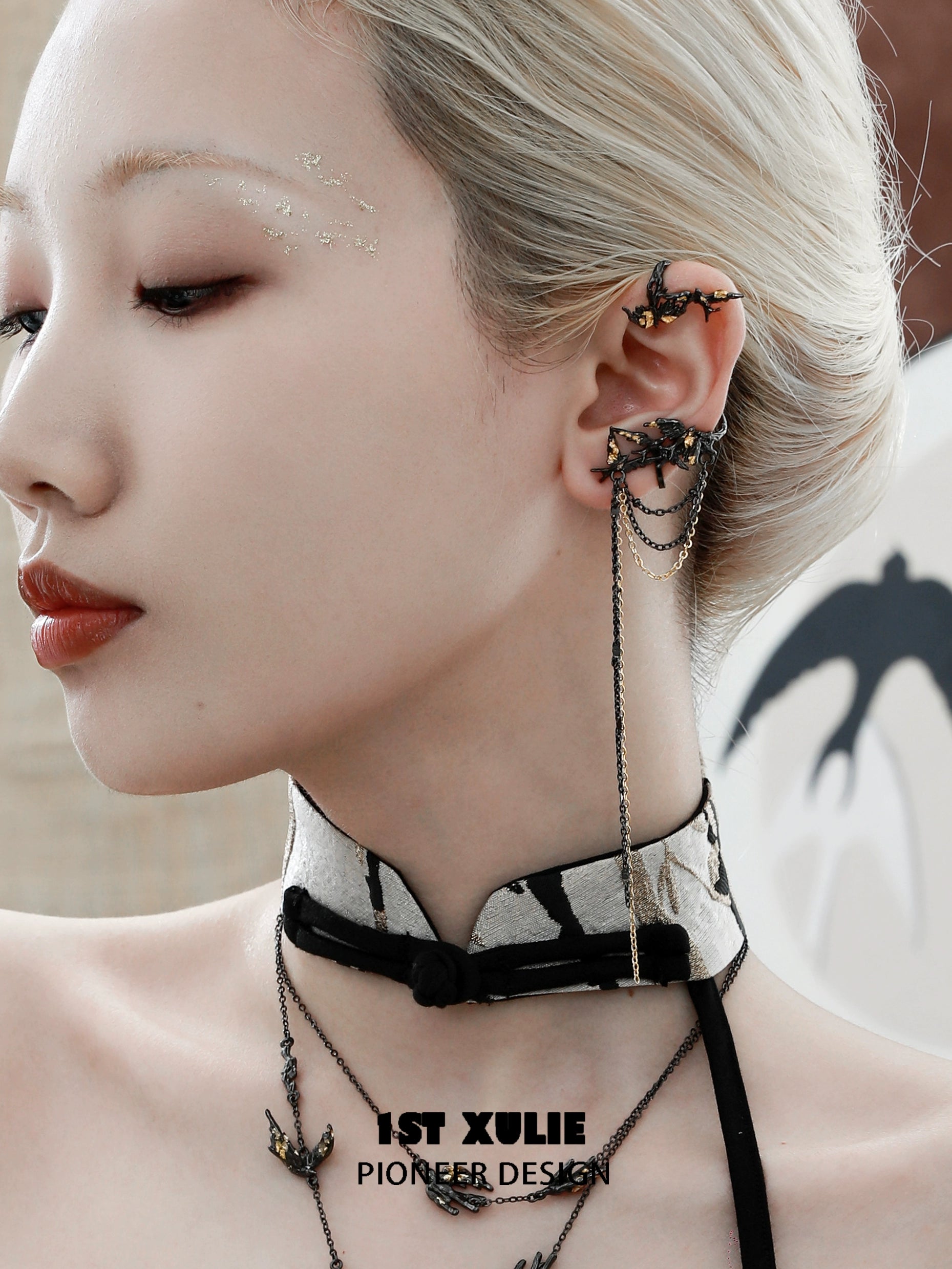 Stylish swallow ear clips by 1STXULIE showcased on a model highlighting unique design and elegance