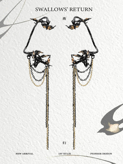 Elegant swallow ear clips featuring intricate design and chains for a unique accessory look
