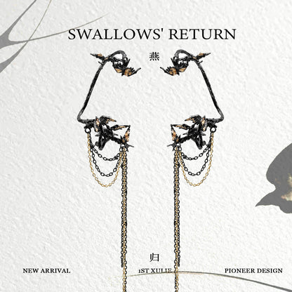 Swallow ear clips featuring intricate design with chains for a unique fashion statement