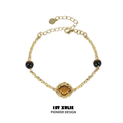 Elegant tiger eye shell silver bracelet with intricate design and adjustable chain for versatile wear