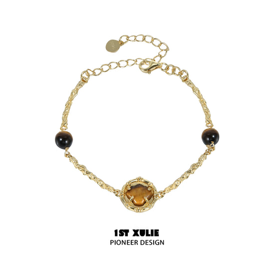 Elegant tiger eye shell silver bracelet with intricate design and adjustable chain for versatile wear