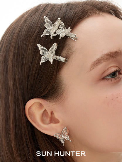 SUN HUNTER transparent butterfly earrings with sparkly details for a stylish accessory look